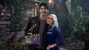 ‘Zombies 4’: Meg Donnelly & Milo Manheim On Growing Up With Disney’s Monster Franchise From Young Stars To Executive Producers For ‘Dawn Of The Vampires’ ‘Zombies 4’: Meg Donnelly & Milo Manheim On Growing Up With Disney’s Monster Franchise From Young Stars To Executive Producers For ‘Dawn Of The Vampires’
