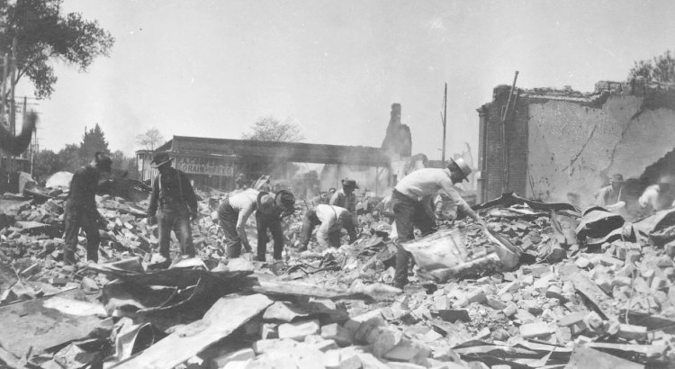 Search of rubble outside the Press Democrat building (California Historical Society)