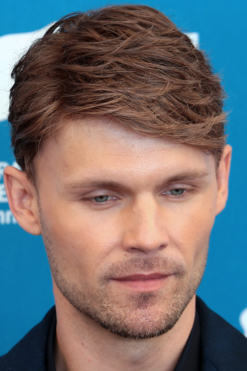 textured side-parted men's hairstyle