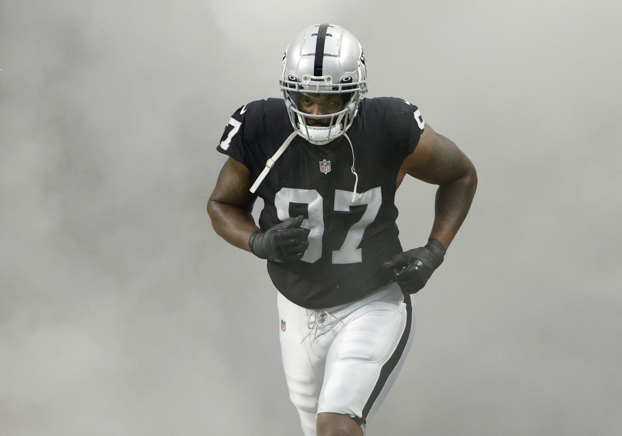 What did the Raiders player throw off the field on...