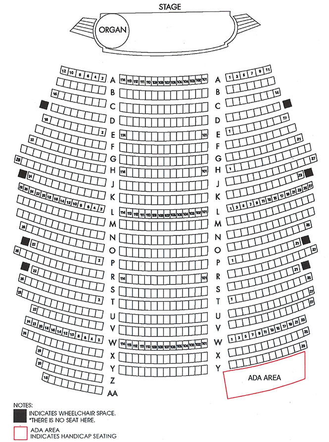 A potted palm and zebra print ru. Seating at the Alabama Theatre - alabamatheatre.com