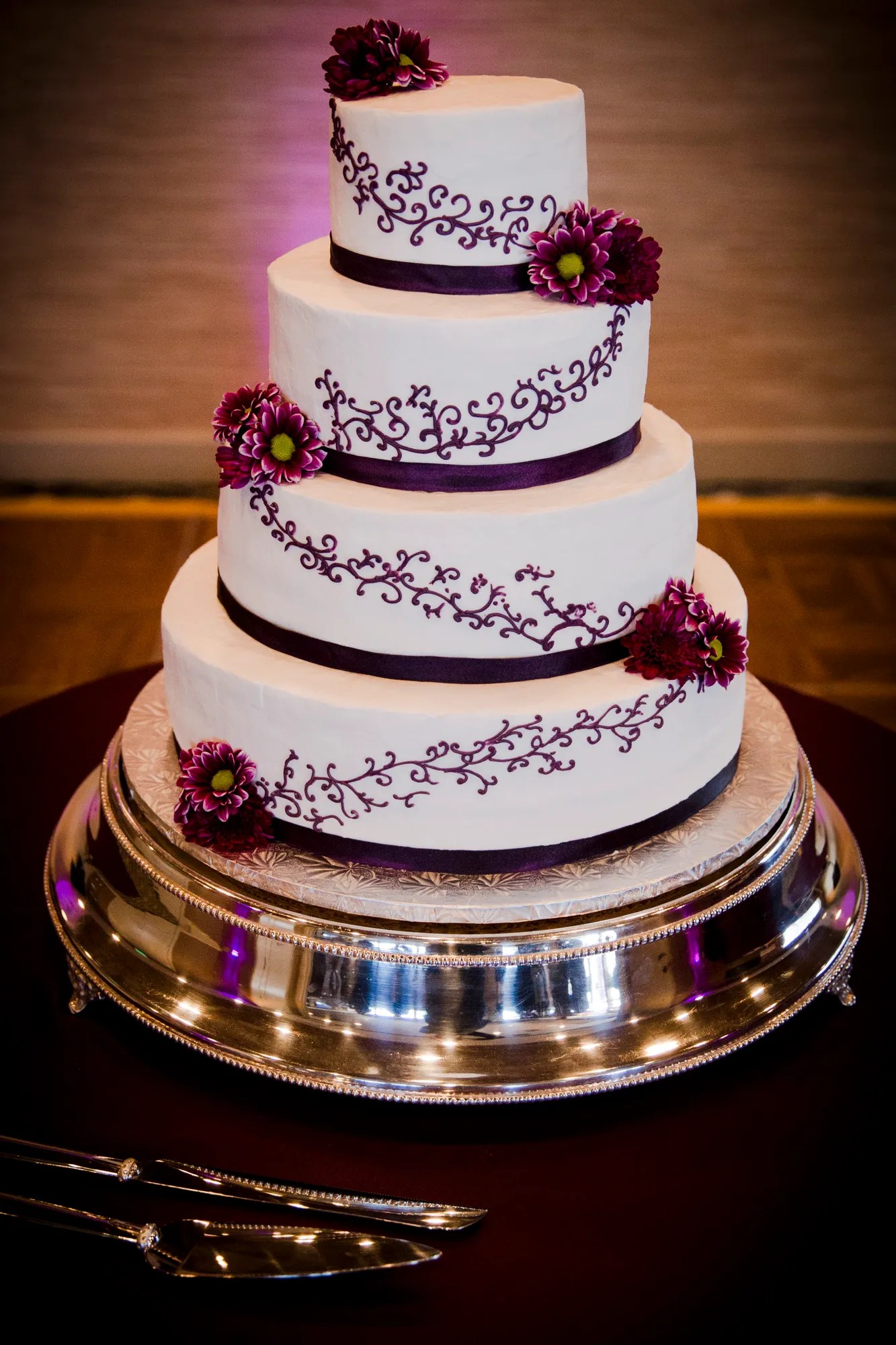 Let green bay botanical garden serve as the beautiful backdrop to your wedding ceremony or reception. Ivory Wedding Cake with Purple Flowers