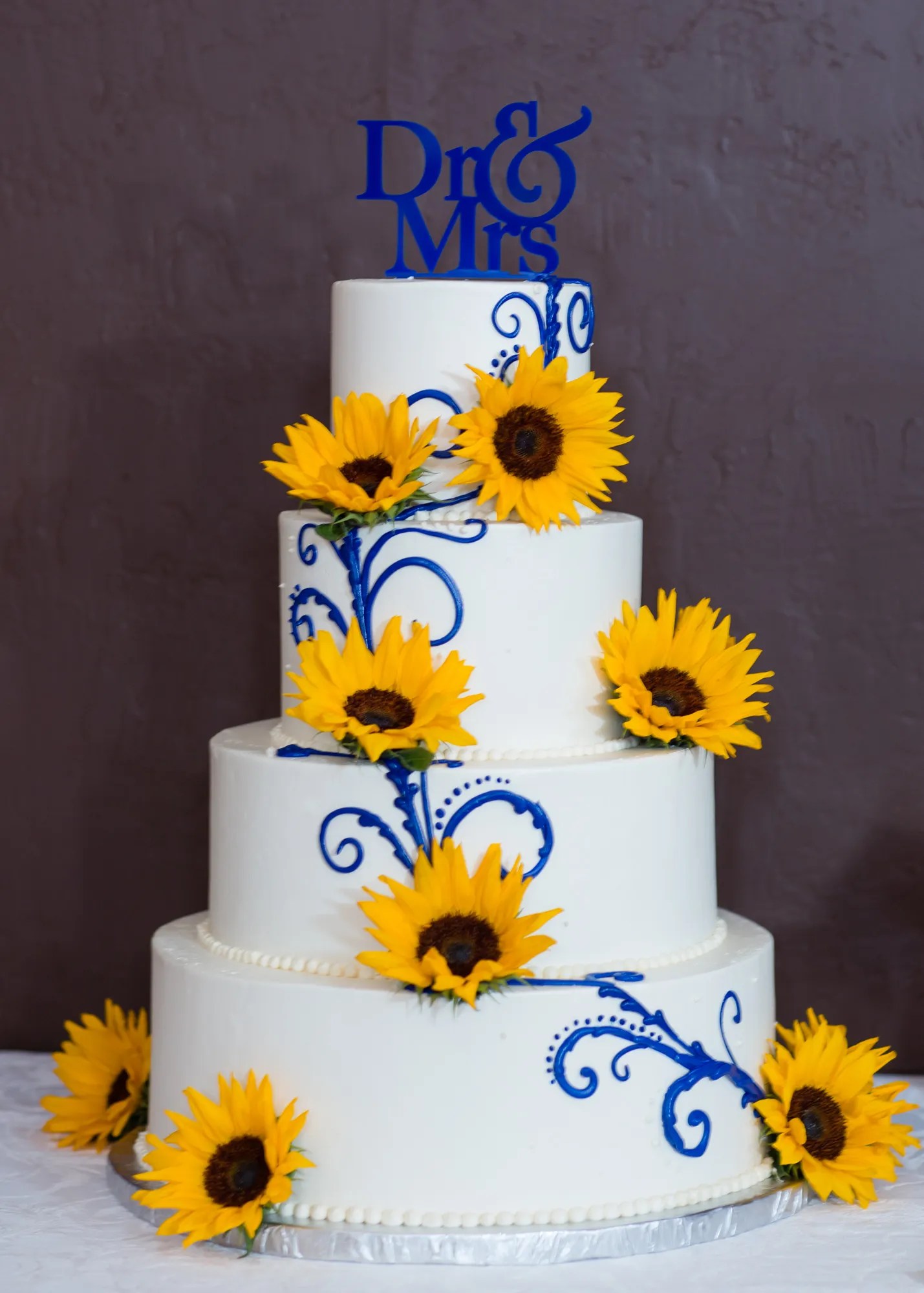 Sunflower wedding bouquets are bright and cheerful and so popular among brides. White and Blue Wedding Cake with Sunflowers and Custom ...