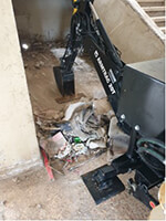 machine moving rubble