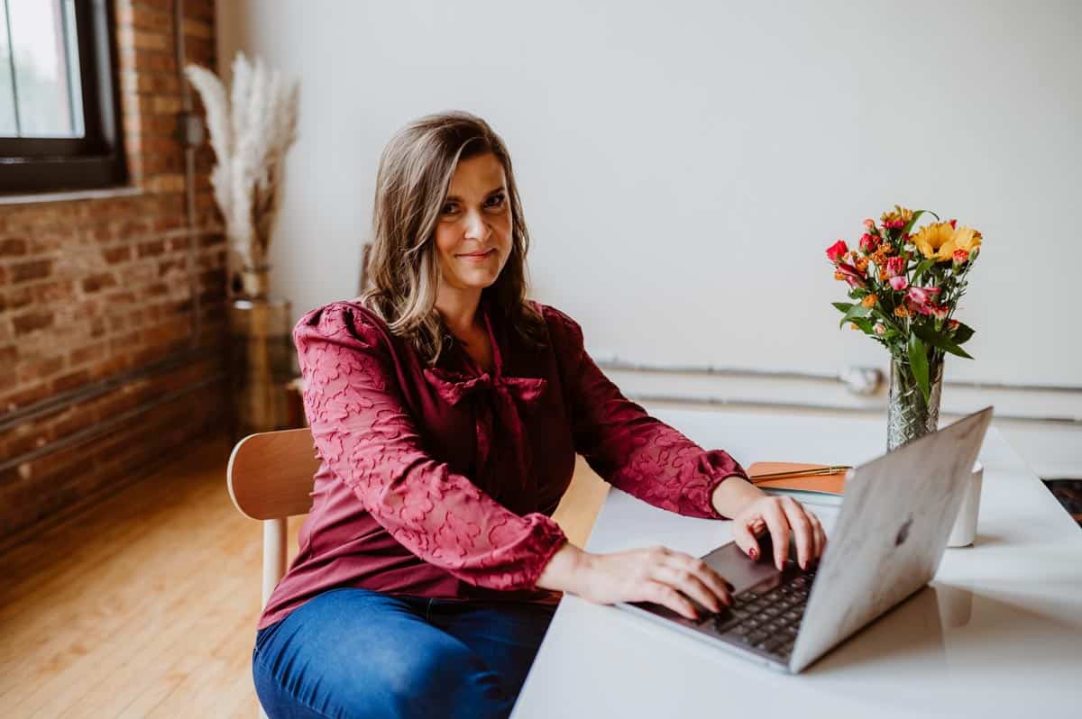 Travel planning expert working on crafting personalized itineraries, using tools like ChatGPT for travel planning.