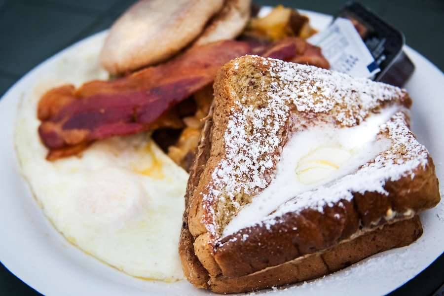 Soft cooked eggs are cooked with tomatoes and zucchini in this colorful and hearty dish. Best Breakfast In The World Traditional Breakfast From Around The World Thrillist