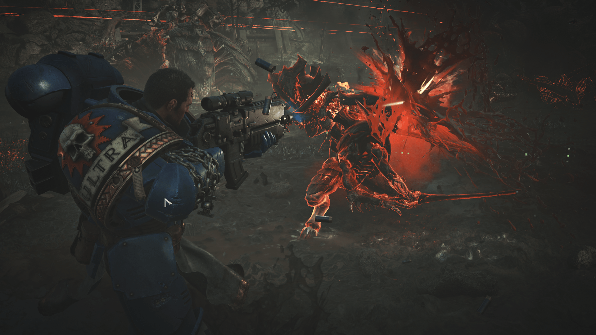 Titus blasts a Tyranid Warrior to bits in Warhammer 40,000: Space Marine 2.