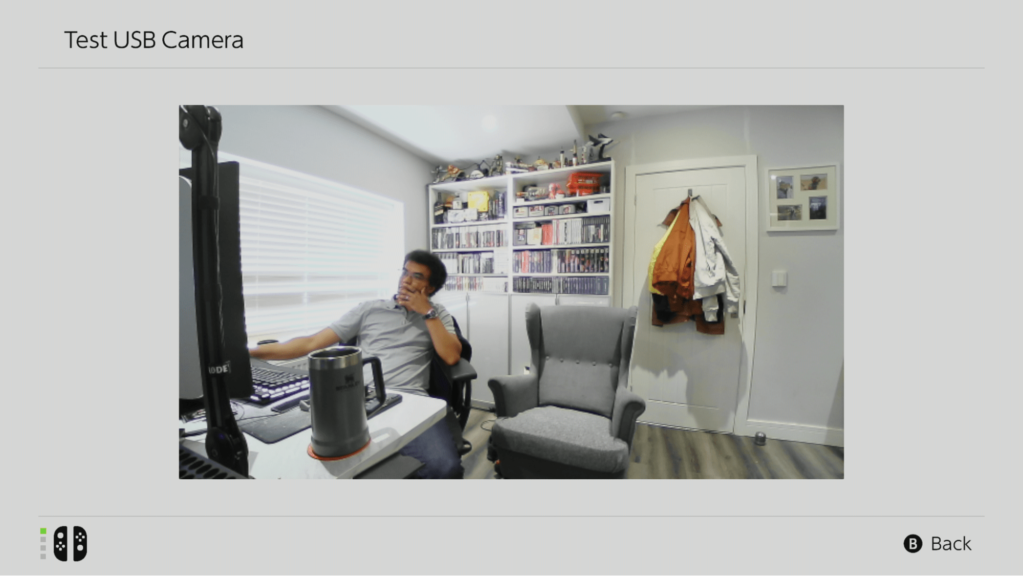 The author sits in his office with a wide angle provided by the official Nintendo Switch 2 USB camera.