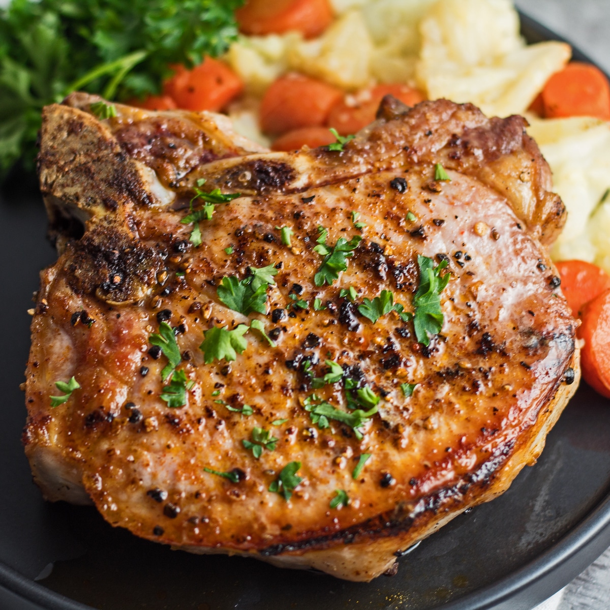 pork chops are a loin cut perpendicularly to the spine of the pig and usually containing a rib or part of a vertebra. Cast Iron Pork Chops Perfectly Seared Pork Chops Bake It With Love