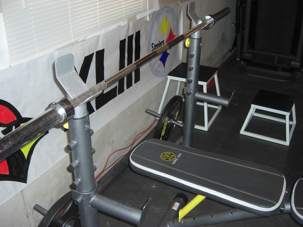 This weight bench is very dangerous to use there's not enough space in between the 2 upright posts to begin with and the detachable rests that you rest the weights on will jar loose if you do much as tap them while trying to rest the weights on them. GOLDS GYM WEIGHT BENCH