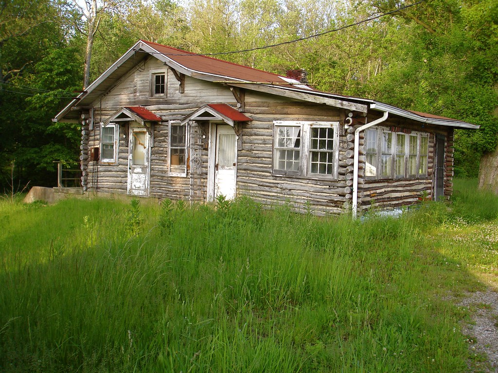 The log cabin quilt block is from the tra. Abandoned Cabins, Benton, IN | This row of little log
