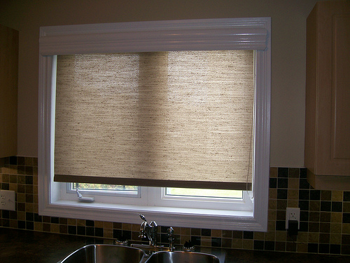 Matchstick blinds are a cost effective way to add to the ambiance of any room and they also offer additional shade and privacy. Roller Shade behind Wood Valance | Roller Shade behind
