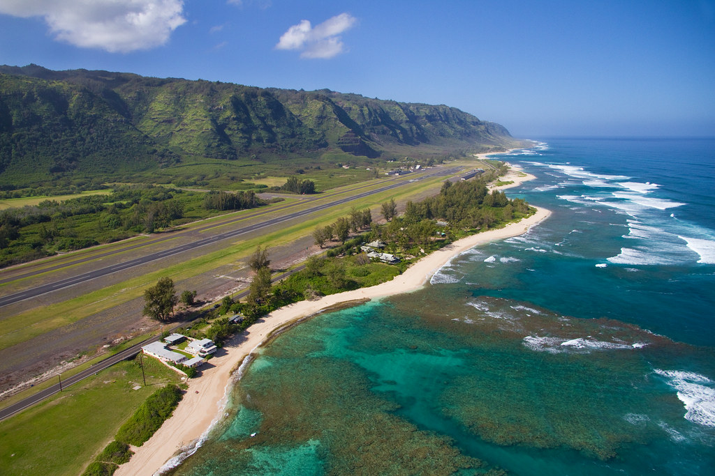 Located to the left of rock piles, log cabins has been a favorite among advanced surfers for decades. North Shore aerial of Oahu, Hawaii | This aerial (from a