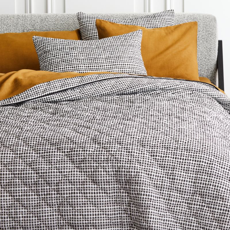 Shop teen room decor, furniture, bedding, and lighting for your bedroom, dorm room, or hangout space. pentagrid black and white quilt cb2