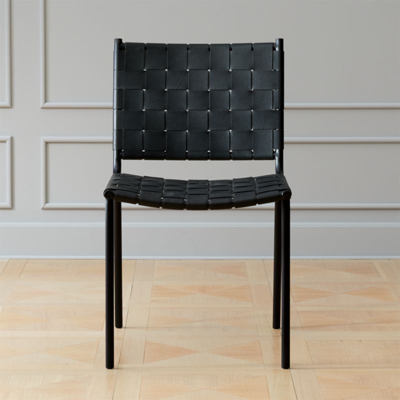 Find inspiring designs for home and office. Woven Black Leather Dining Chair + Reviews | CB2