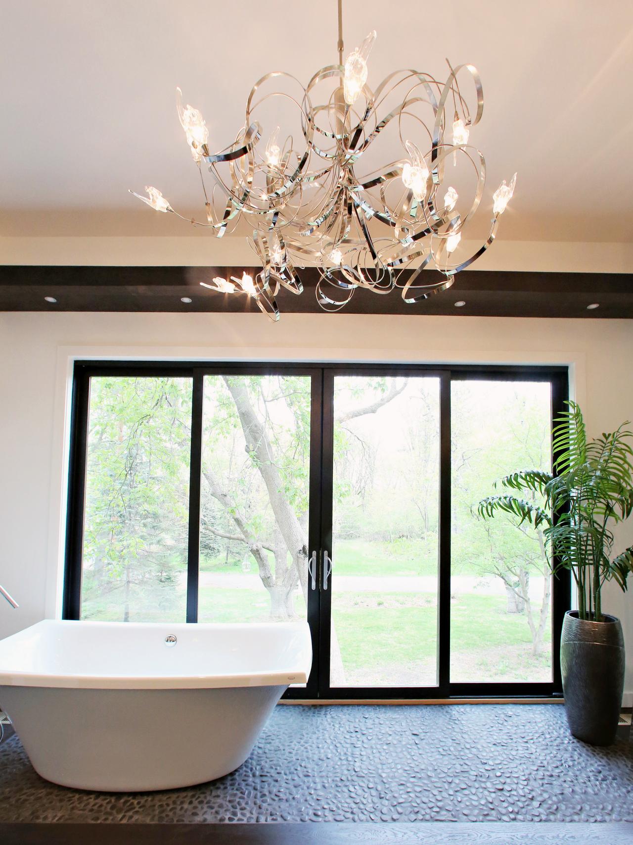 Is there anything more relaxing than slipping into the tub after a long day? 20 Luxurious Bathrooms with Elegant Chandelier Lighting