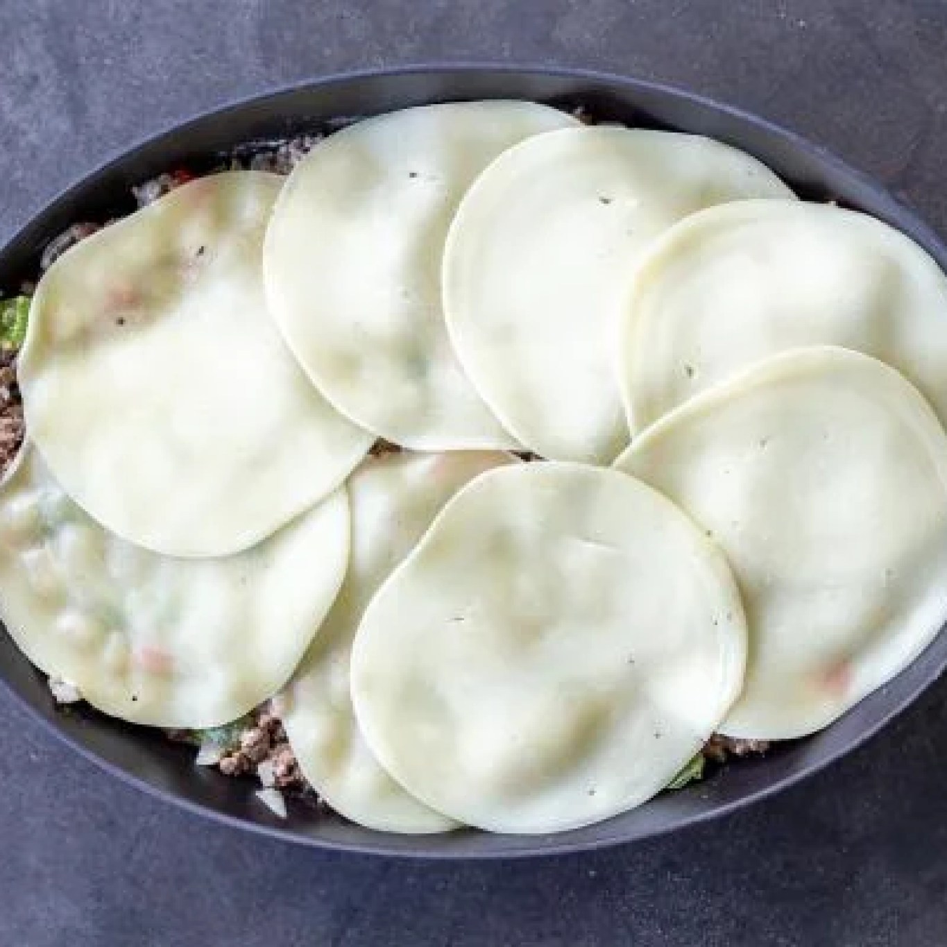 Cheese on top of Philly Cheesesteak Casserole.