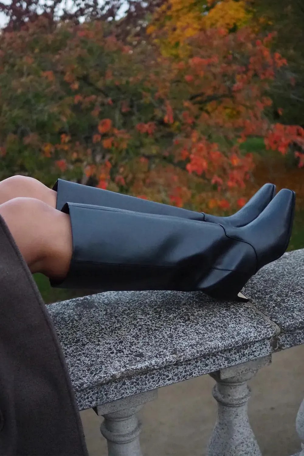 @astyleedit wears H&M's 2024 edition knee-high boots