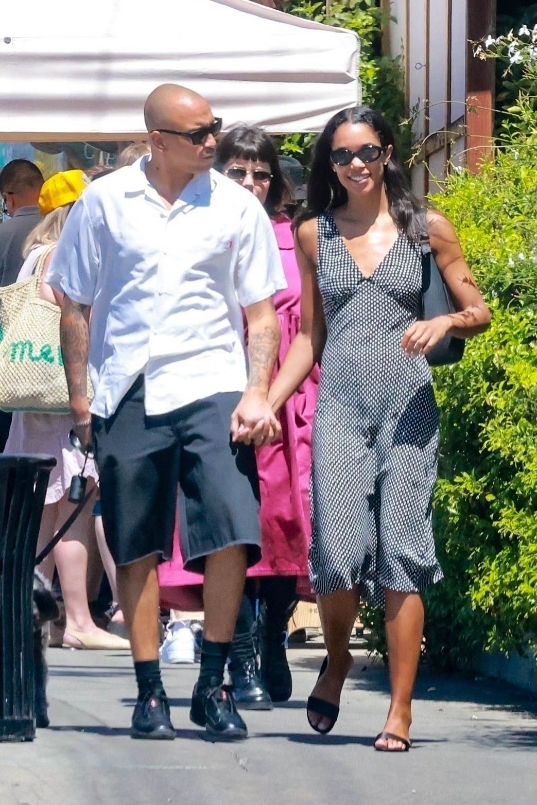 Laura Harrier wears a Vneck Bias Cut Dress