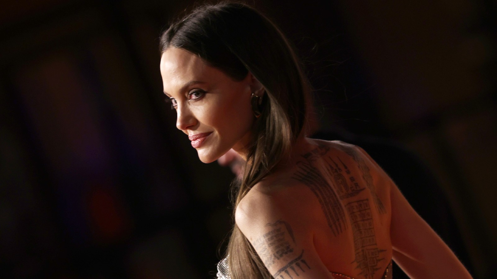 What Do Angelina Jolie's Tattoos Really Mean? | Woman & Home | 900_x_1600_jpg