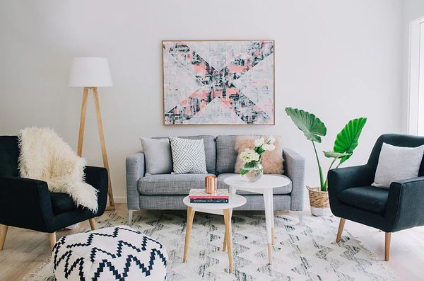 Including one huge piece of art on a wall makes quite a . 8 Ways To Add The Wow Factor To Your Living Room F G