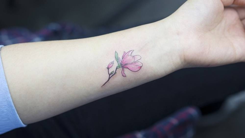Magnolia Tattoos | Tattoofilter 562_x_1000_jpg