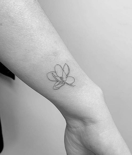 Magnolia Tattoo On The Wrist. 654_x_560_jpg