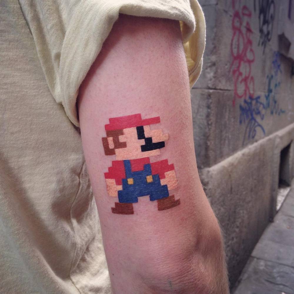 Pixelated Mario Bros. Tattoo On The Back Of The Right 1000_x_1000_jpg