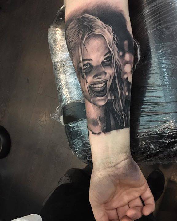 Black And Grey Harley Quinn Tattoo On The Right Inner