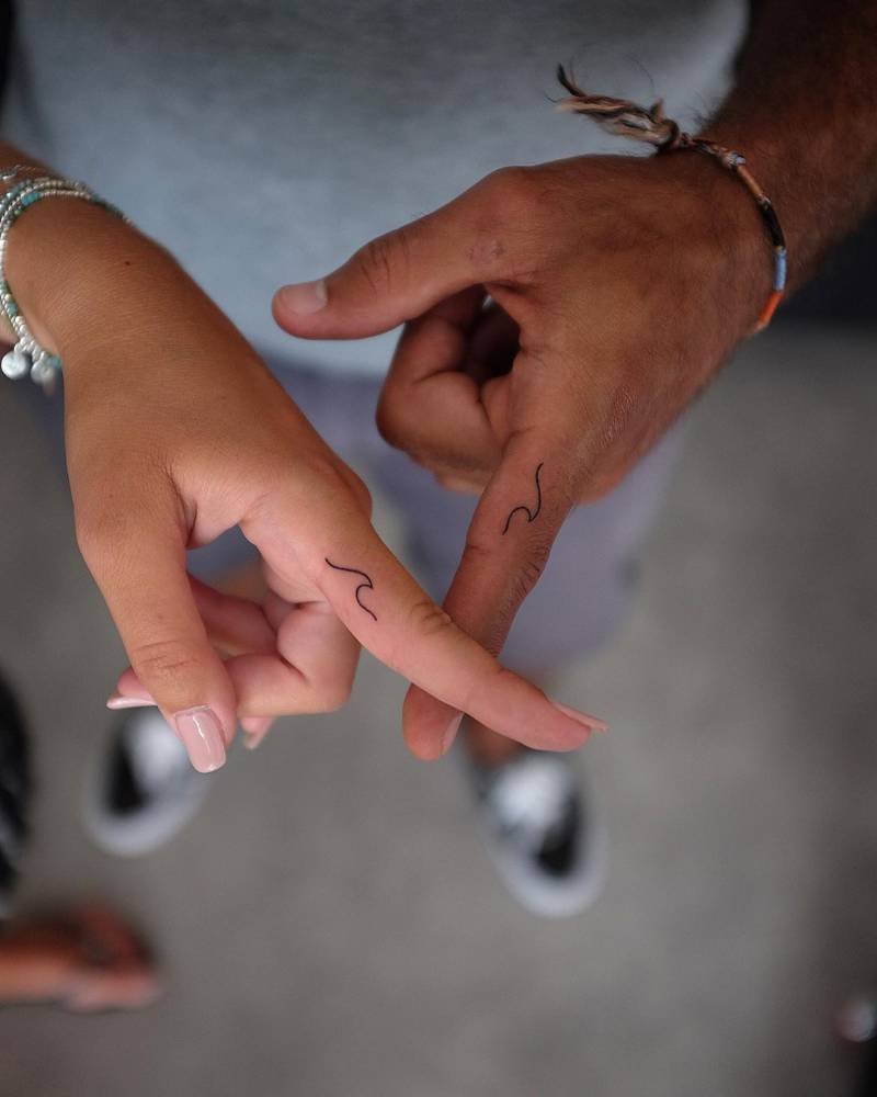 Matching Couple Tattoo Of A Minimalist Wave. 1000_x_800_jpg