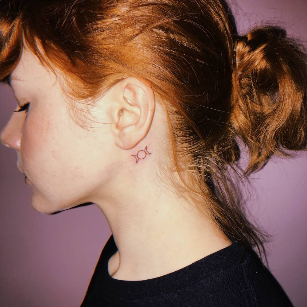 The lowercase g behind her ear is reportedly in honor of her baby. Moon Phases Tattoo Behind The Ear
