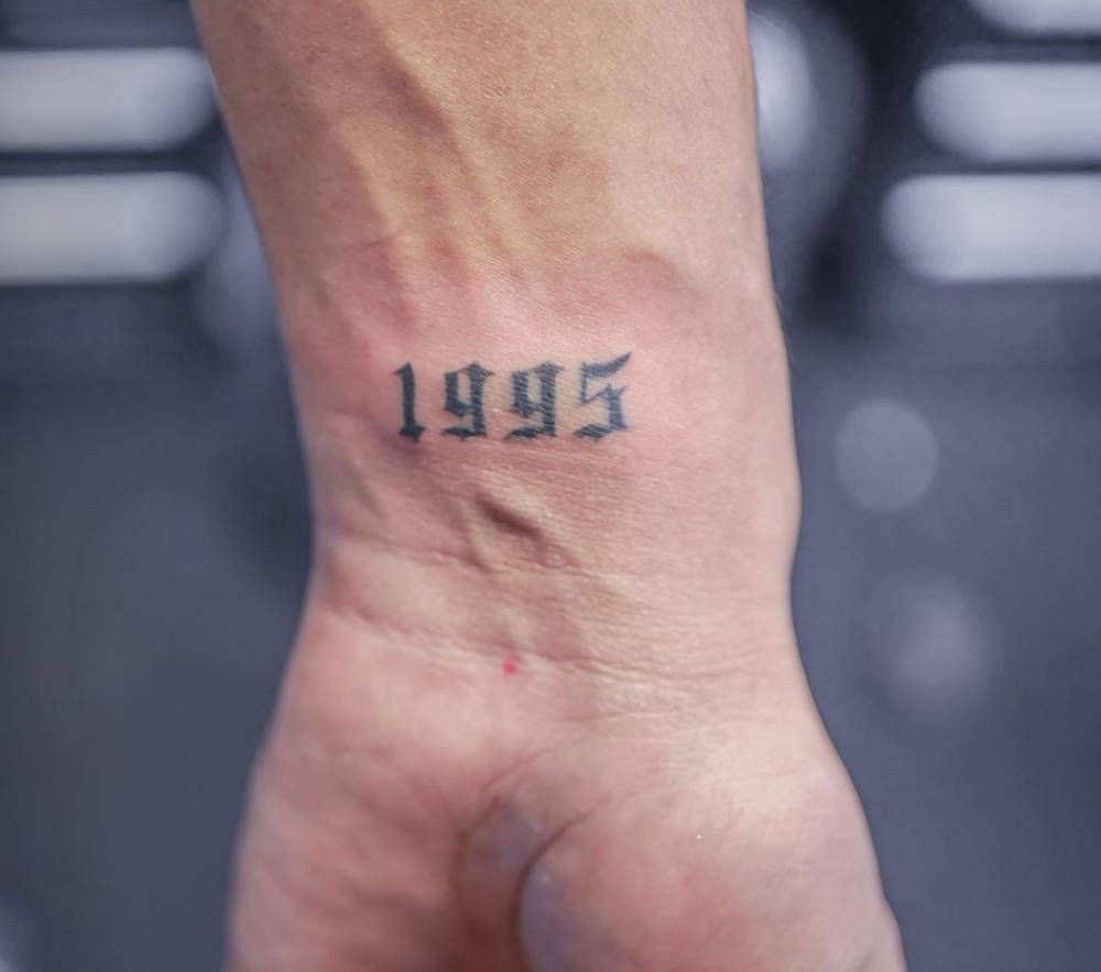 1995" Lettering Tattoo On Wrist 883_x_1000_jpg