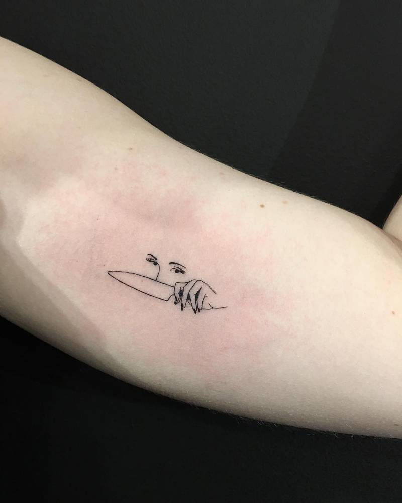 Fine Line Woman Holding A Knife Tattoo On The Left 1000_x_800_jpg