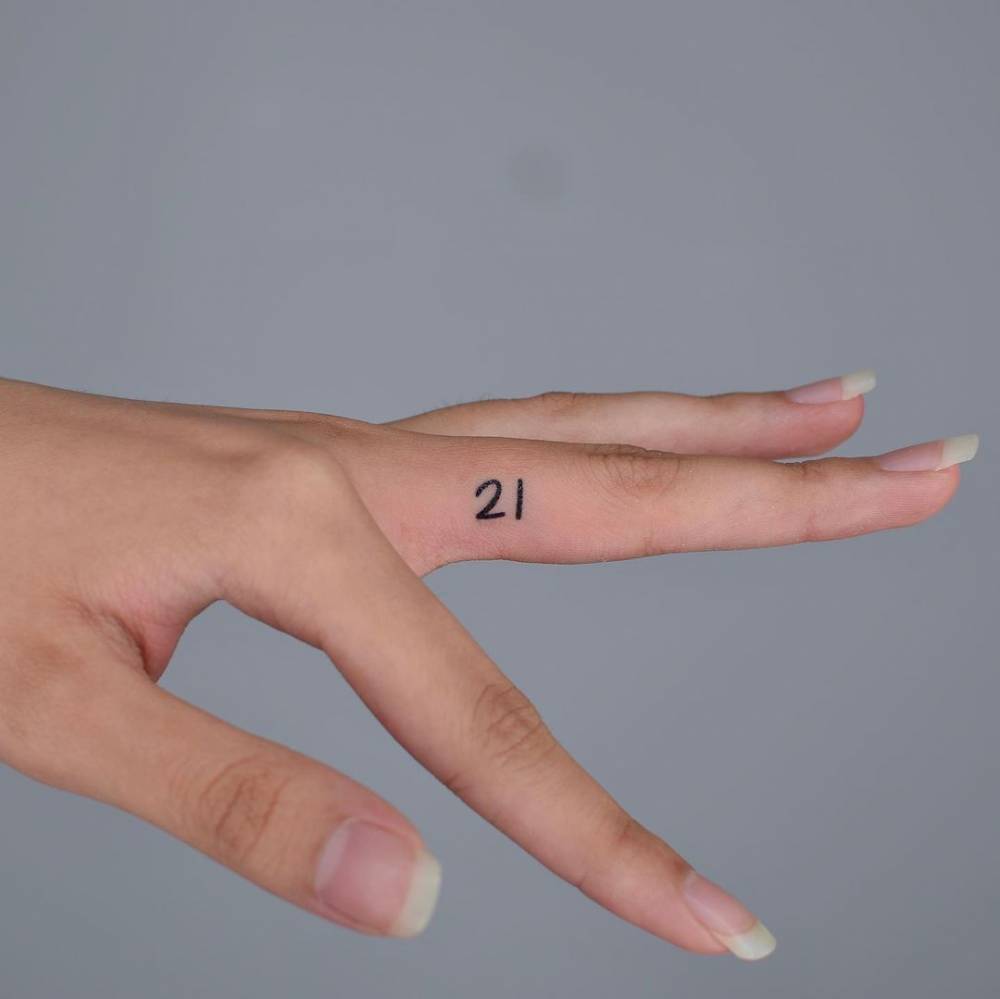 Minimalist Number "21" Tattoo On The Finger 999_x_1000_jpg