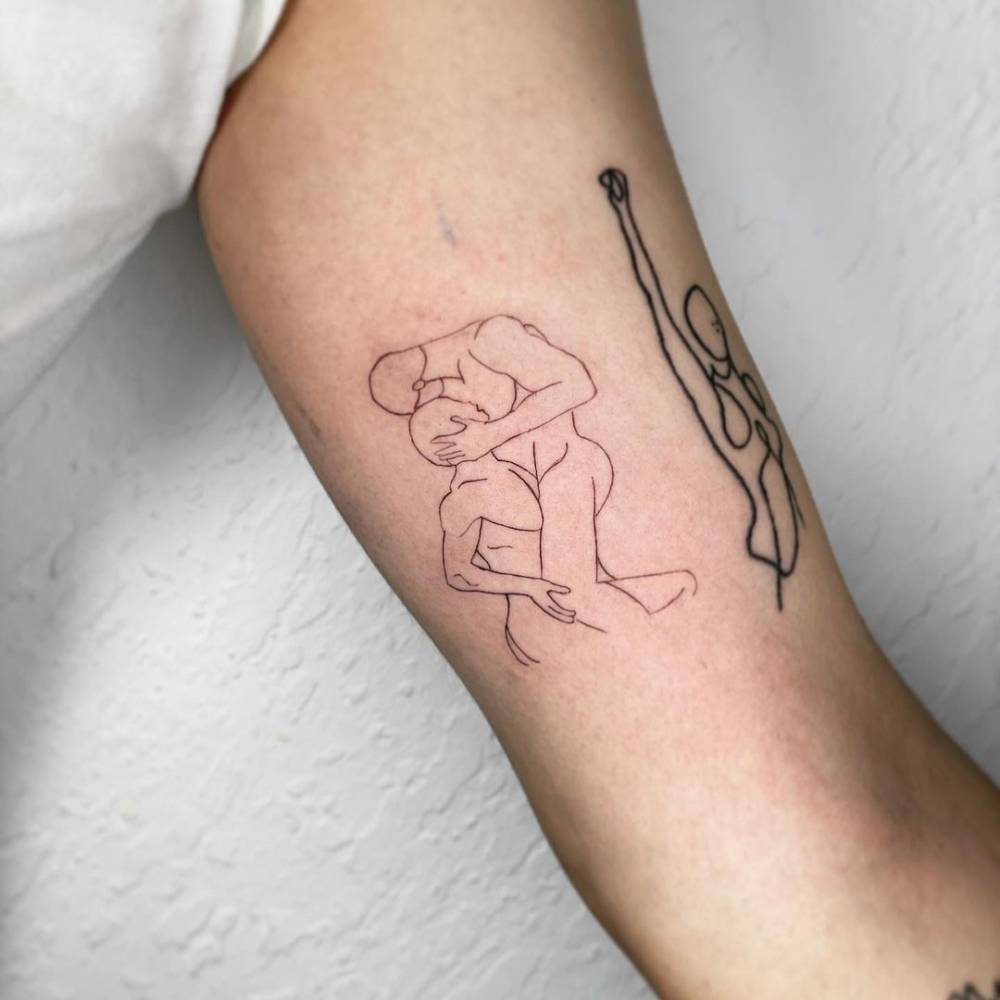 Fine Line Kiss Tattoo On The Inner Arm 1000_x_1000_jpg