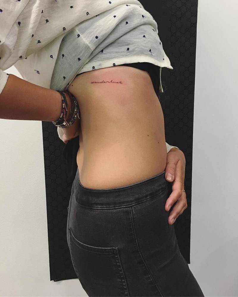 Wanderlust” Tattoo On The Right Side Ribcage. 1000_x_800_jpg