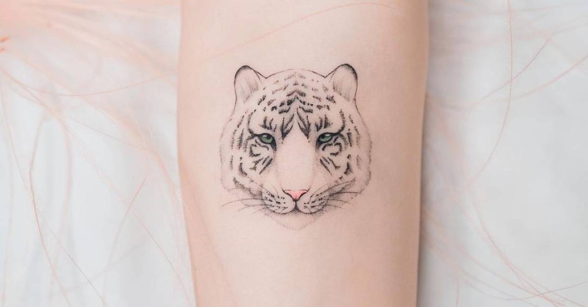 Snow Leopard Portrait Tattoo On The Inner Arm. 628_x_1200_jpg