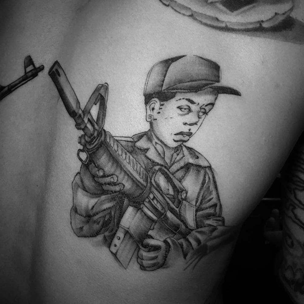 Soldier Boy Tattoo On Chris Brown's Back. 1000_x_1000_jpg