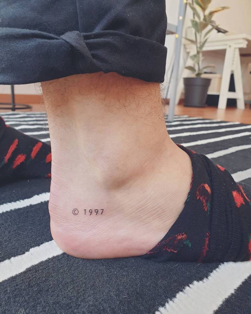 1997" Lettering Tattoo On The Ankle. 1000_x_800_jpg
