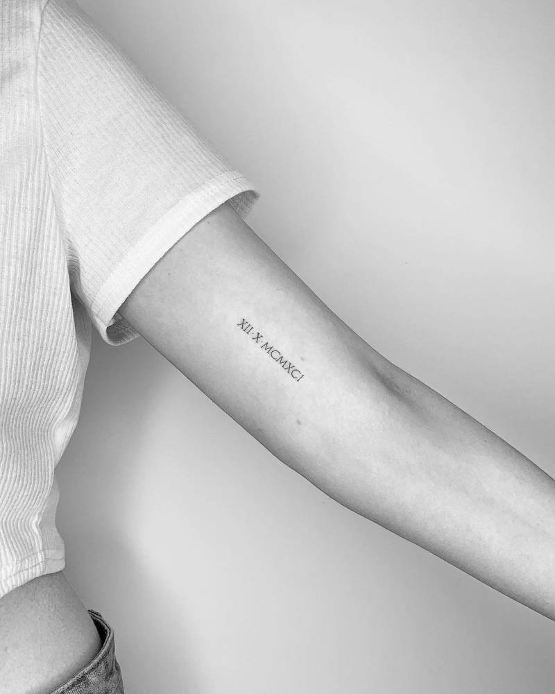 Roman Numerals Tattoo On The Inner Arm. 1000_x_800_jpg