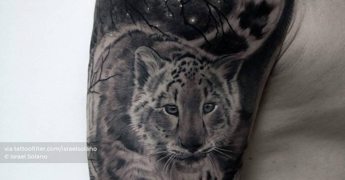 Black And Grey Snow Leopard Tattoo On The Upper Arm. 628_x_1200_jpg