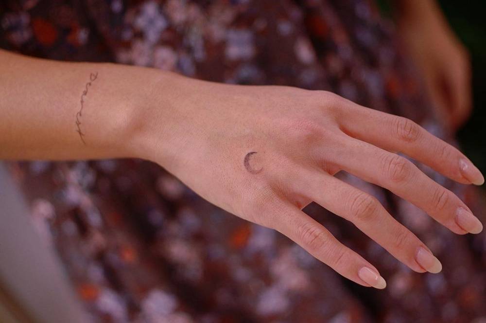 Minimalist Crescent Moon Tattoo On The Hand. 664_x_1000_jpg