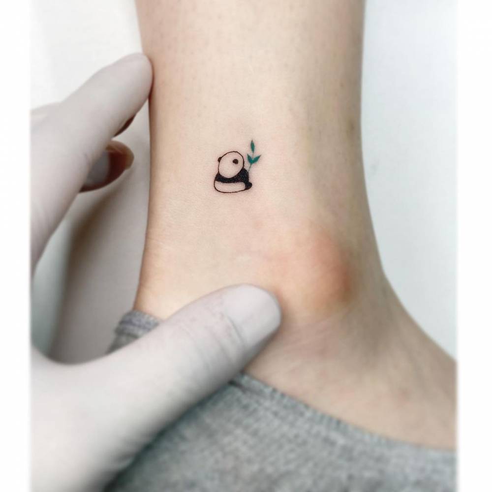 Minimalist Panda Tattoo On The Ankle.