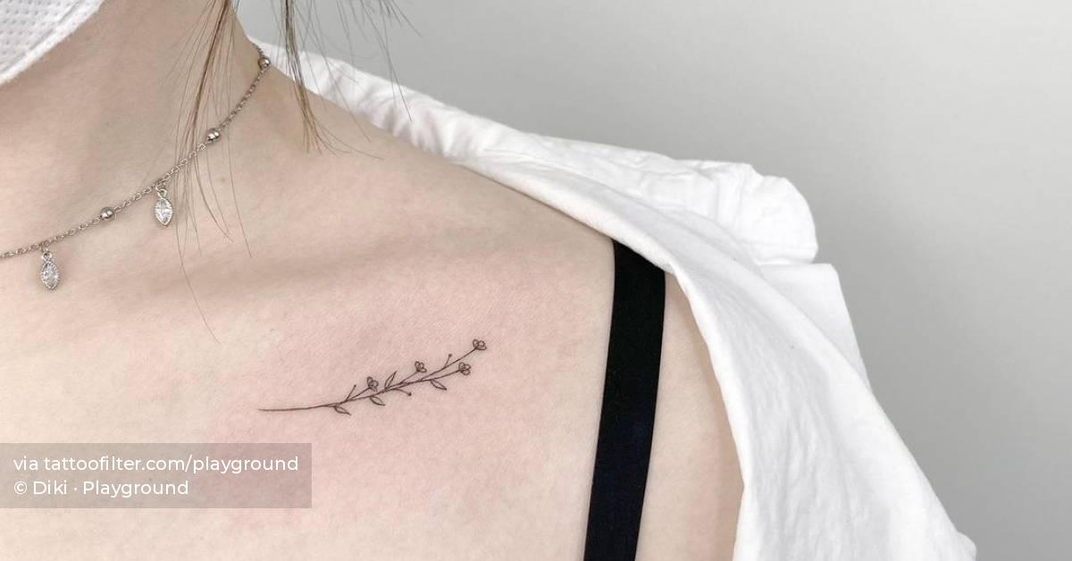 Fine Line Flower Tattoo On The Collarbone. 628_x_1200_jpg