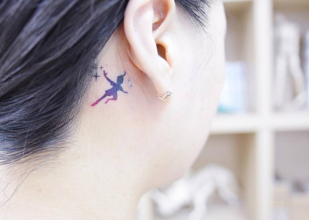 Peter Pan Tattoo Behind The Right Ear. 712_x_1000_jpg