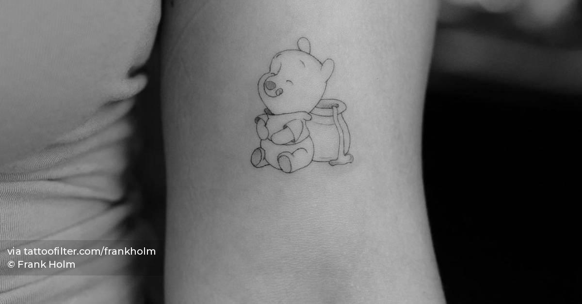 Pooh Bear Tattooed On The Bicep. 628_x_1200_jpg