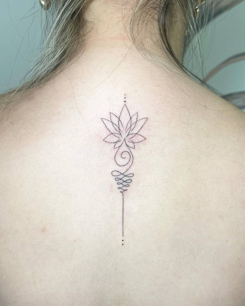 Tattoo Of A Lotus Unalome Located On The Upper Back. 1000_x_800_jpg
