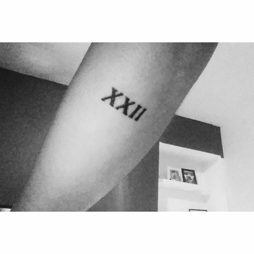 Xxii" (22 In Roman Numerals) On Aleksandra's Forearm. 1000_x_1000_jpg