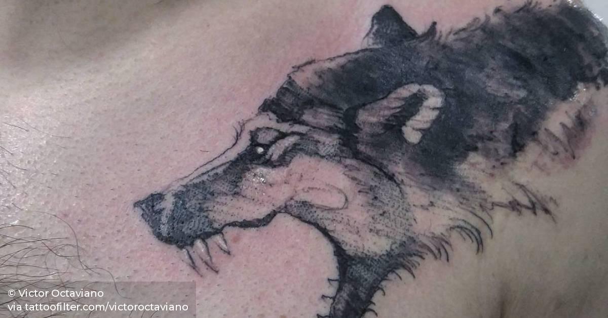 Sketchy Wolf Tattoo On The Left Shoulder And Chest.
