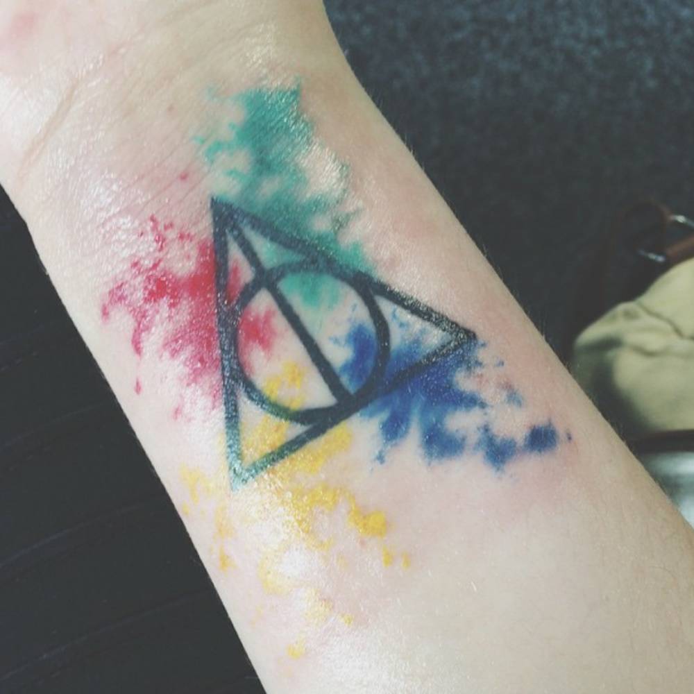 Wrist Tattoo On Angie With The Sign Of The Deathly 1000_x_1000_jpg